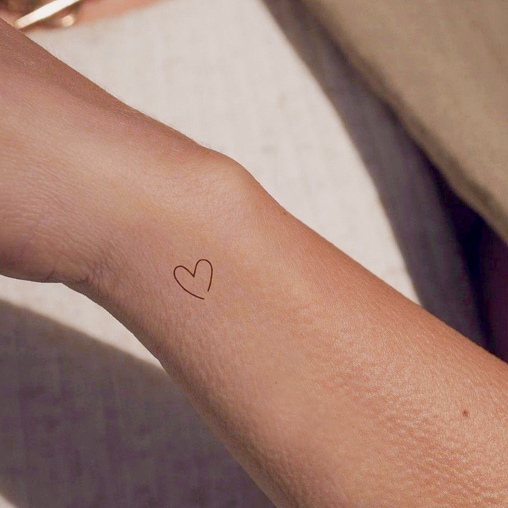 Open heart silhouette tattoo