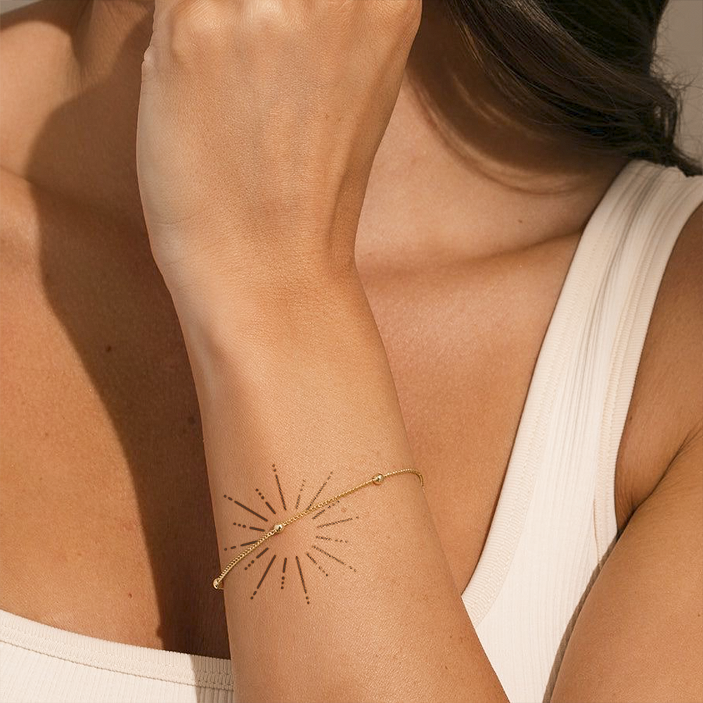 tatuagem artística de sol