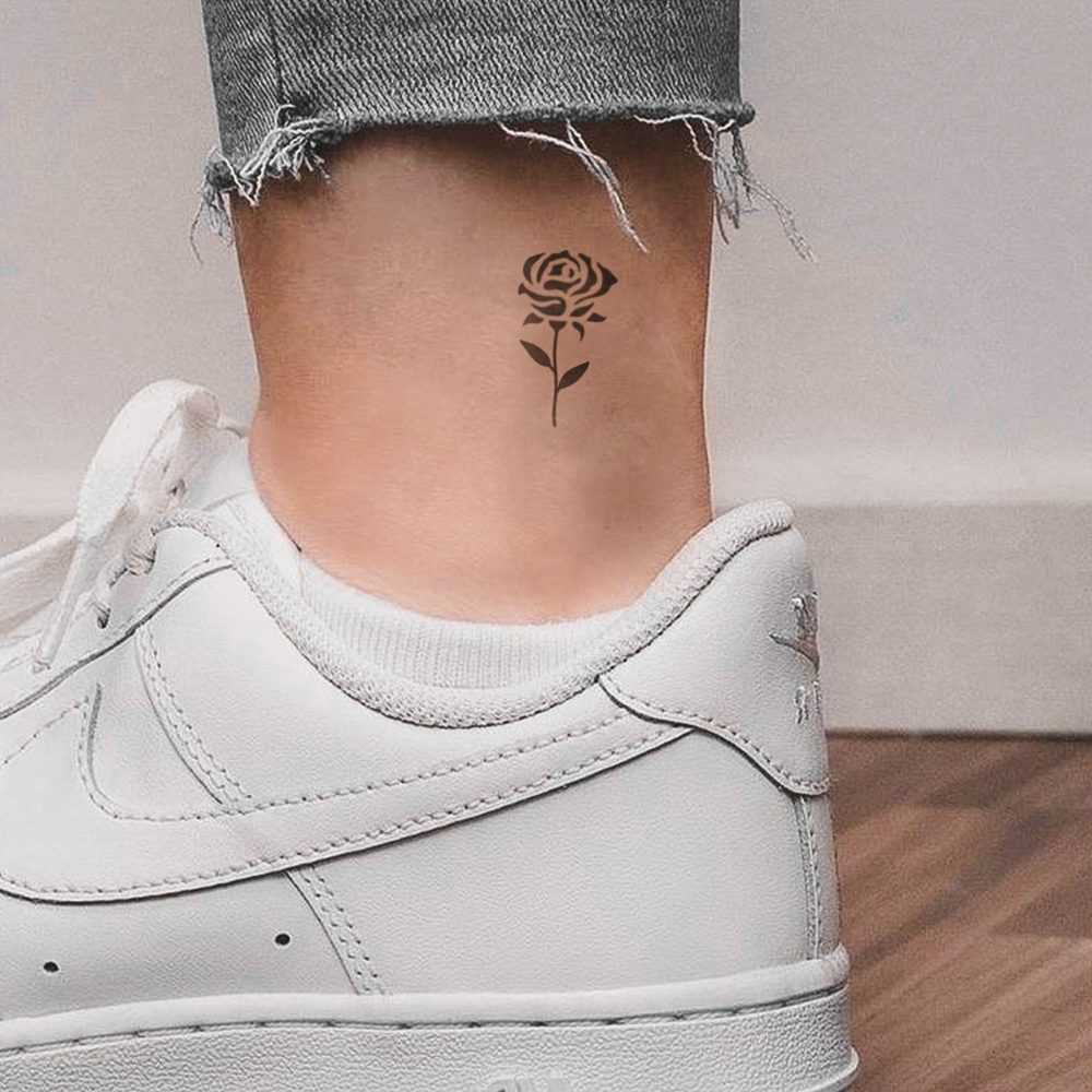 Black rose small tattoo