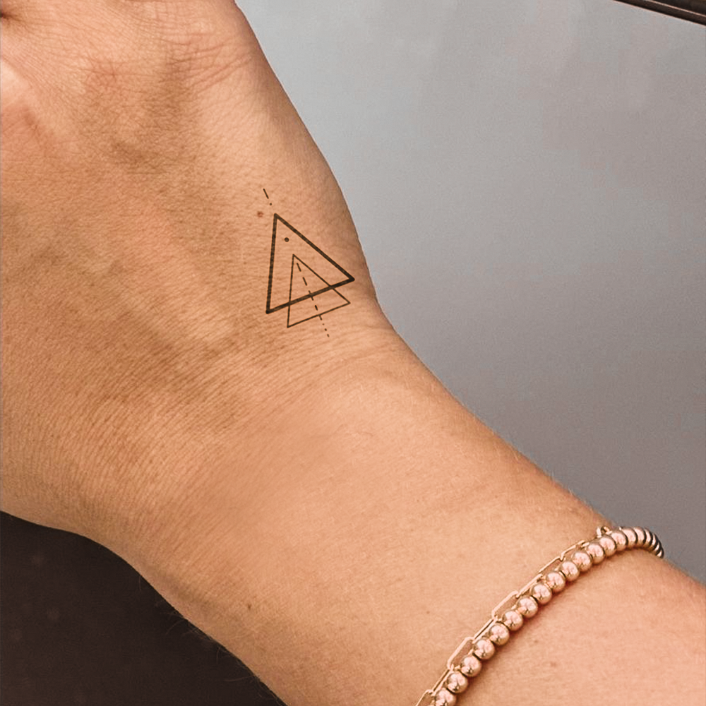 Triangle mandala tattoo
