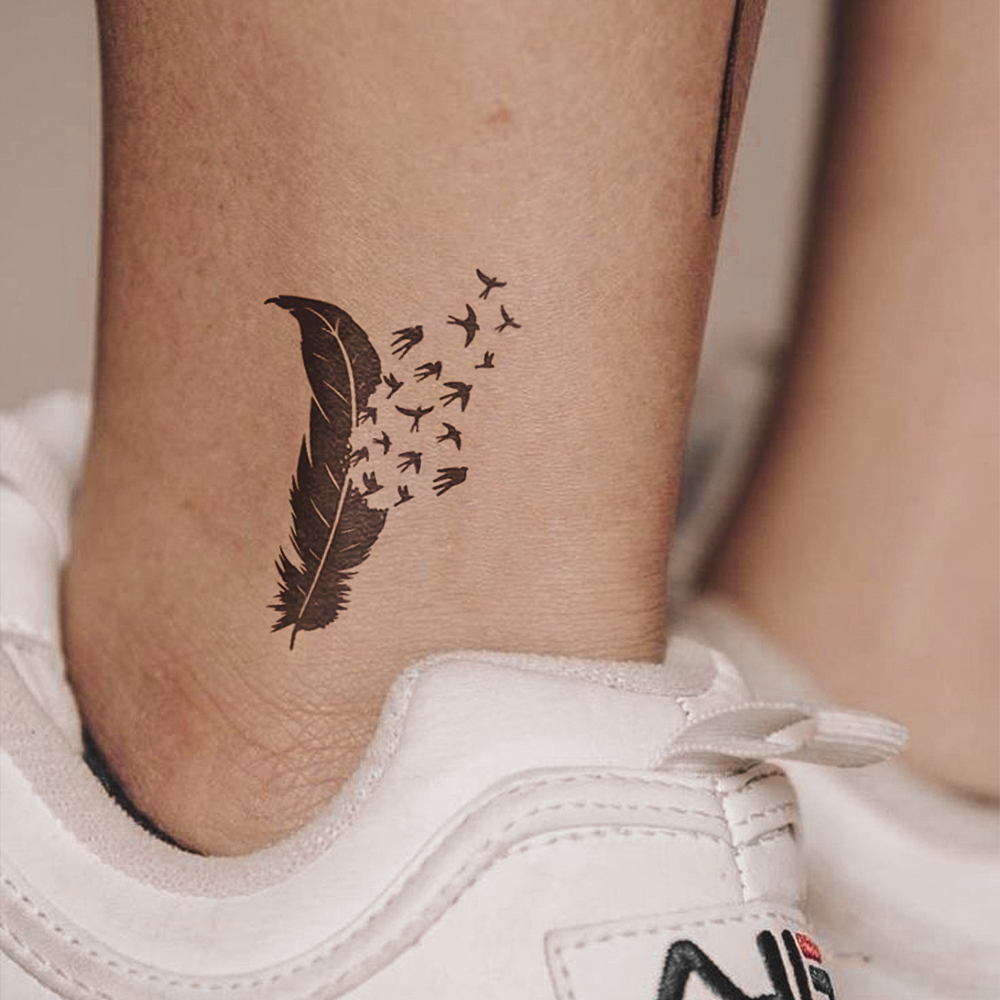 Feather tattoo with birds