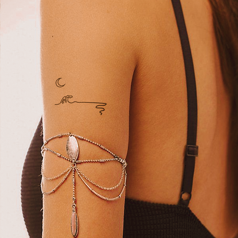 Moon and sea tattoo