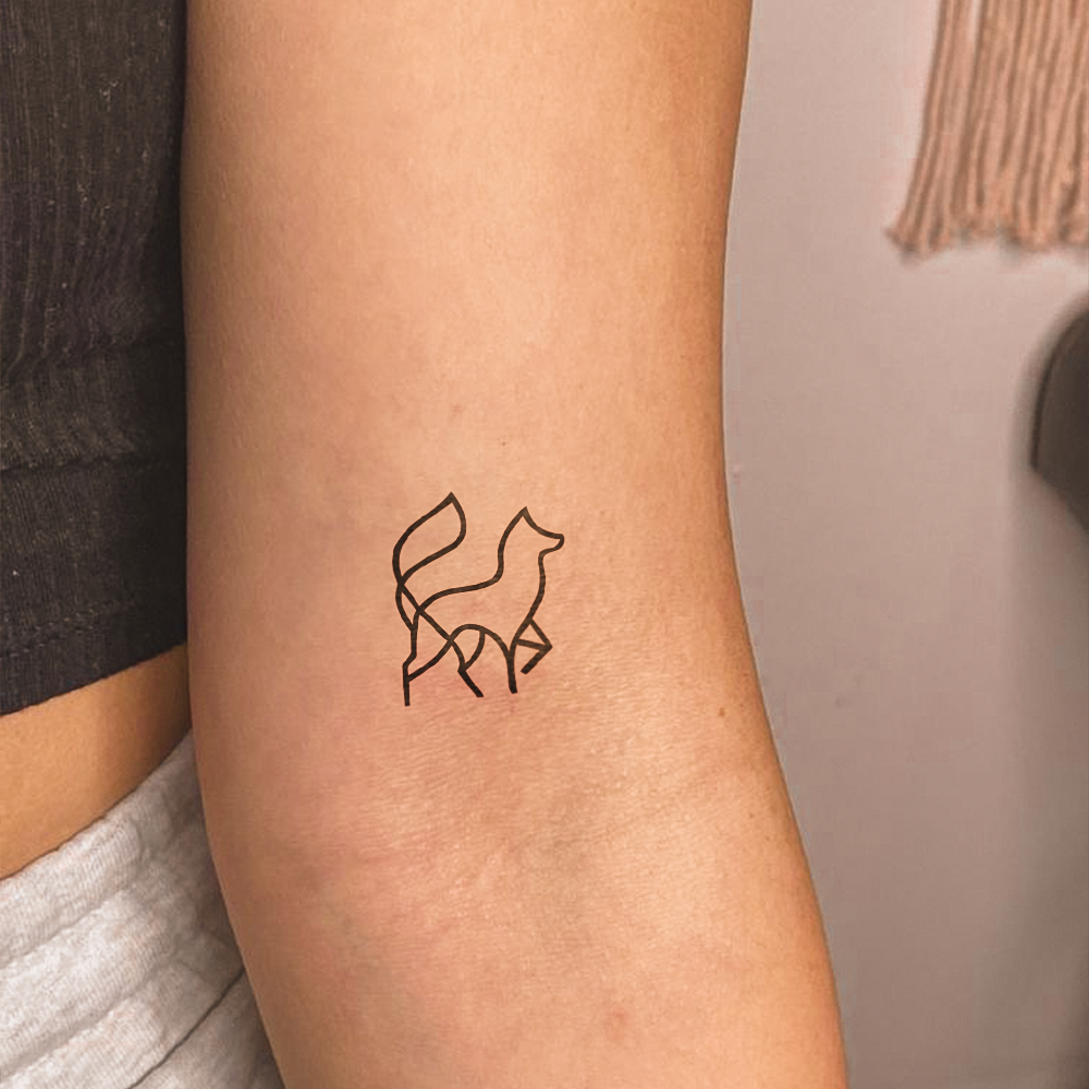 Wolf Silhouette Tattoo