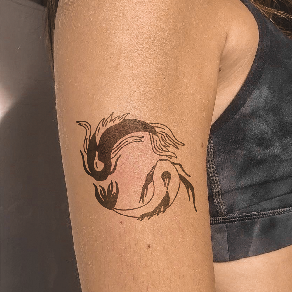 Tatuagem de peixe Yin e Yan