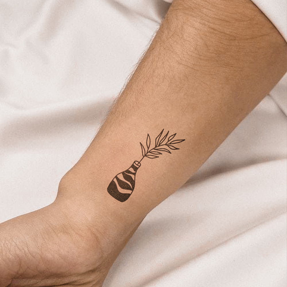 Tatuagem de pequeno vaso de zebra