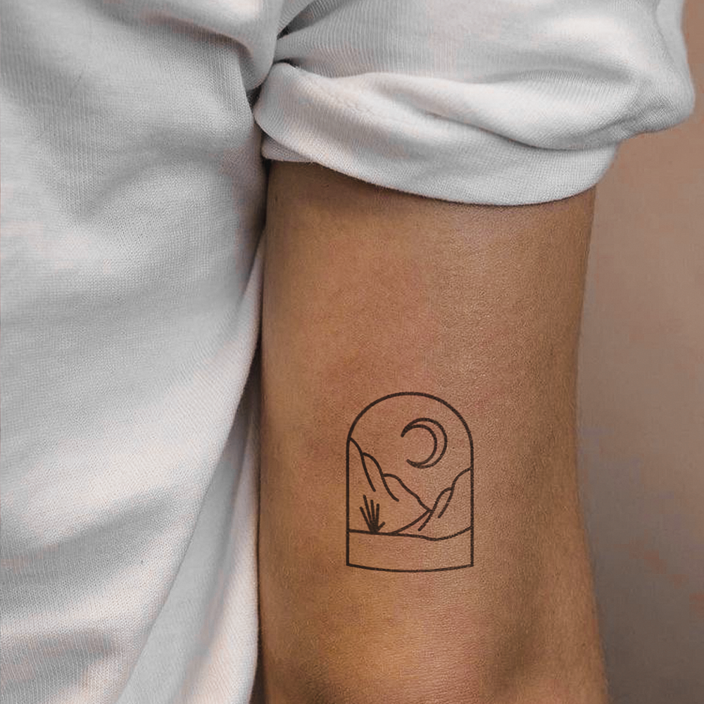 Window tattoo with landscape and moon