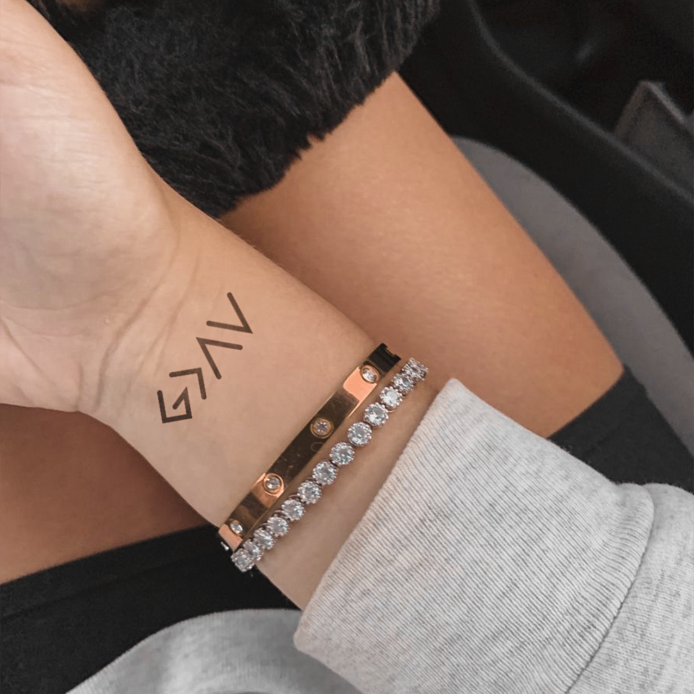 Deus é melhor que a tatuagem de altos e baixos