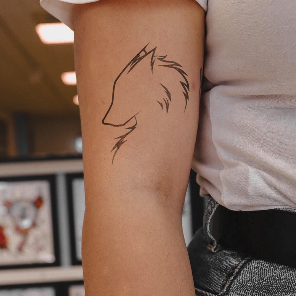 Wolf Head Silhouette Tattoo