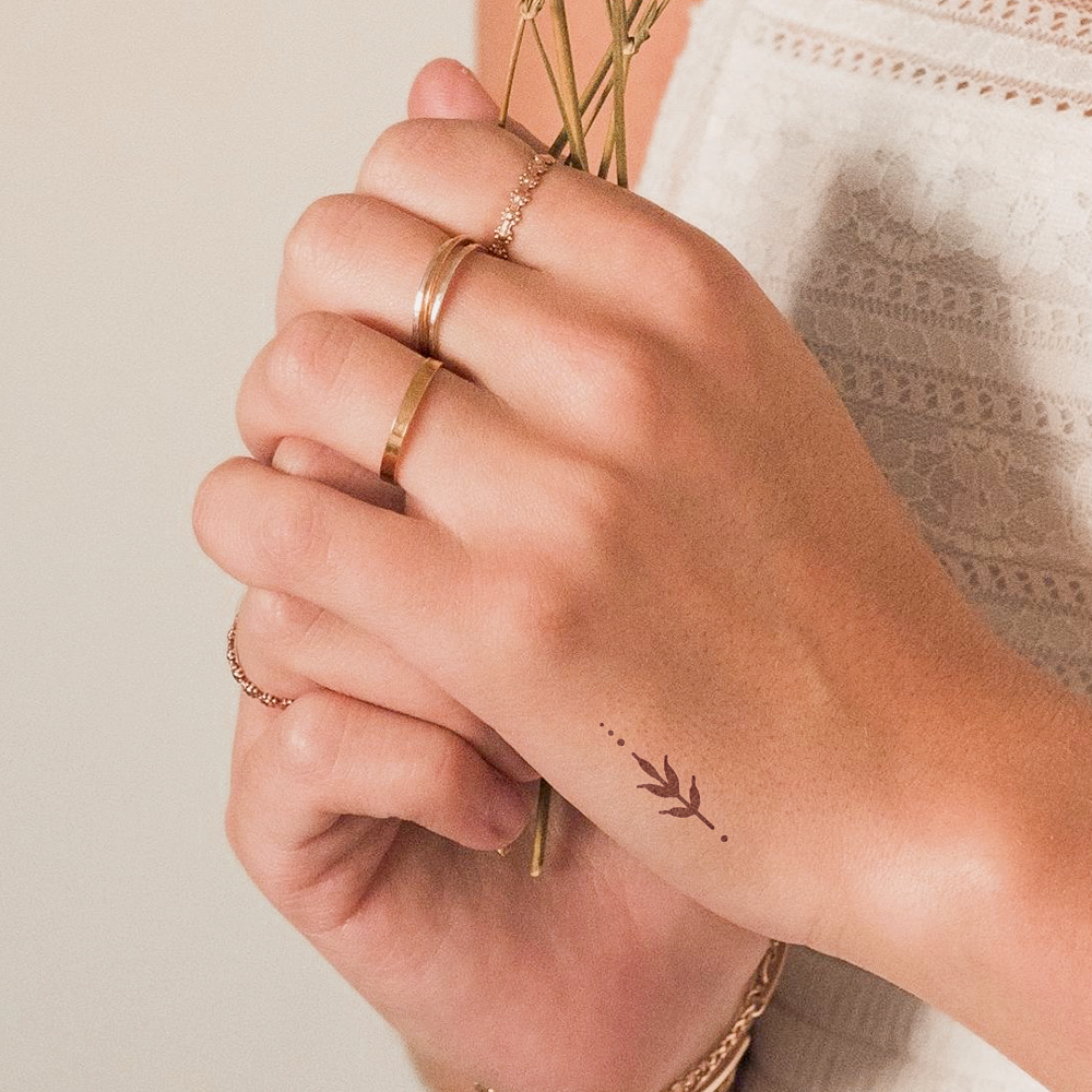 Flower tattoo with dots