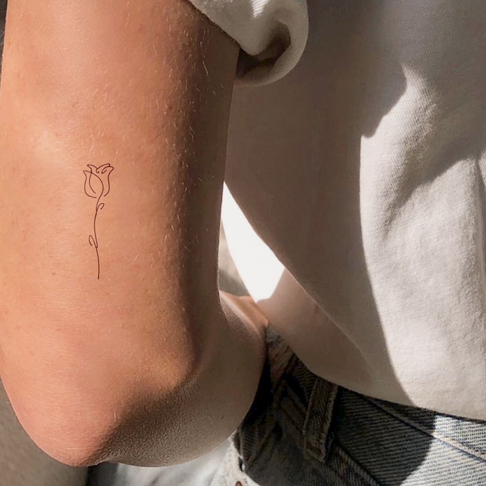Rose flower silhouette tattoo