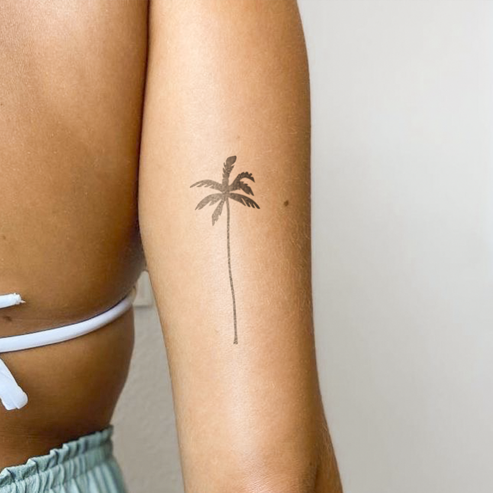 Large palm tree tattoo