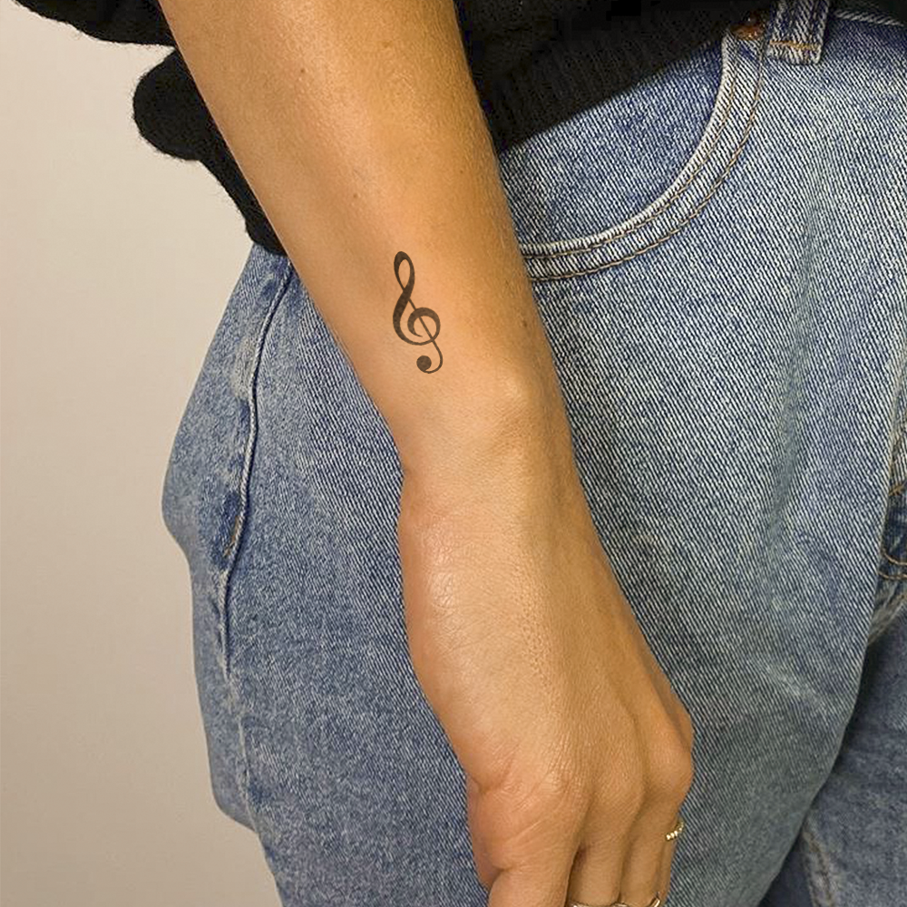 Treble clef tattoo