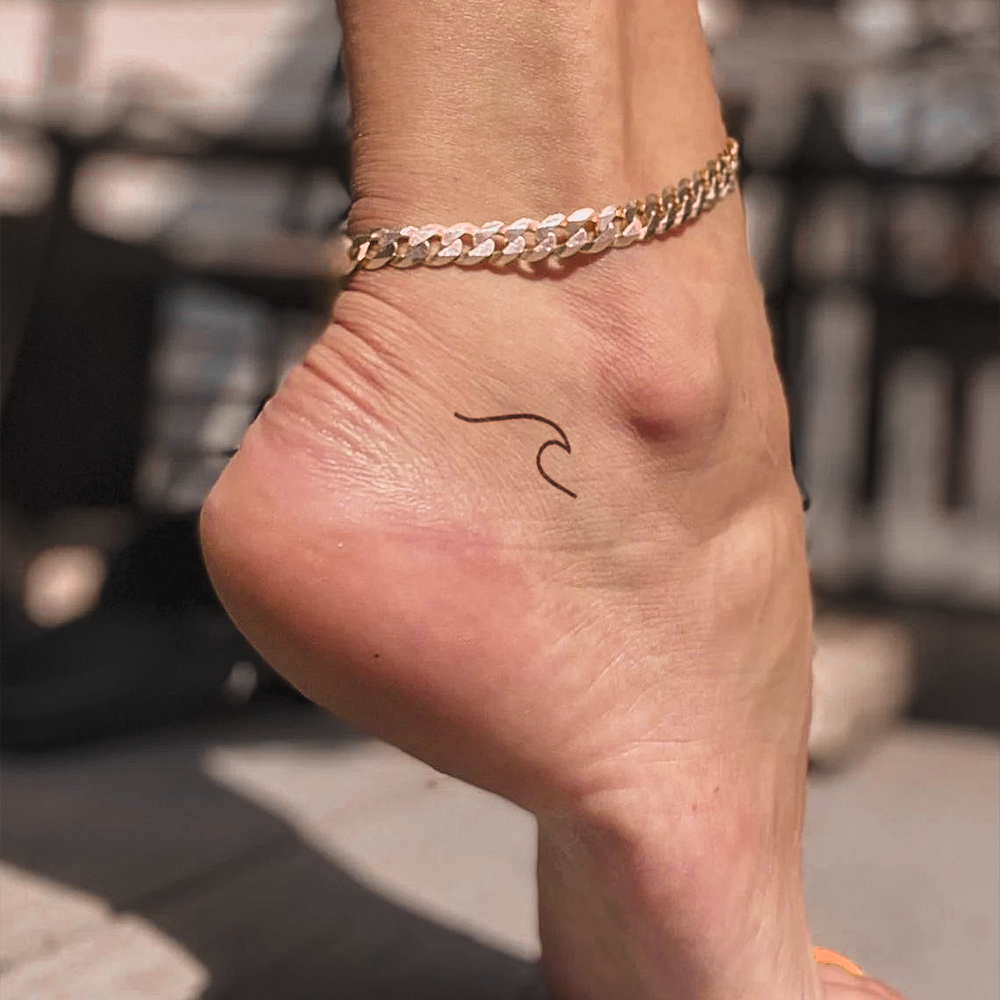 Wave silhouette tattoo