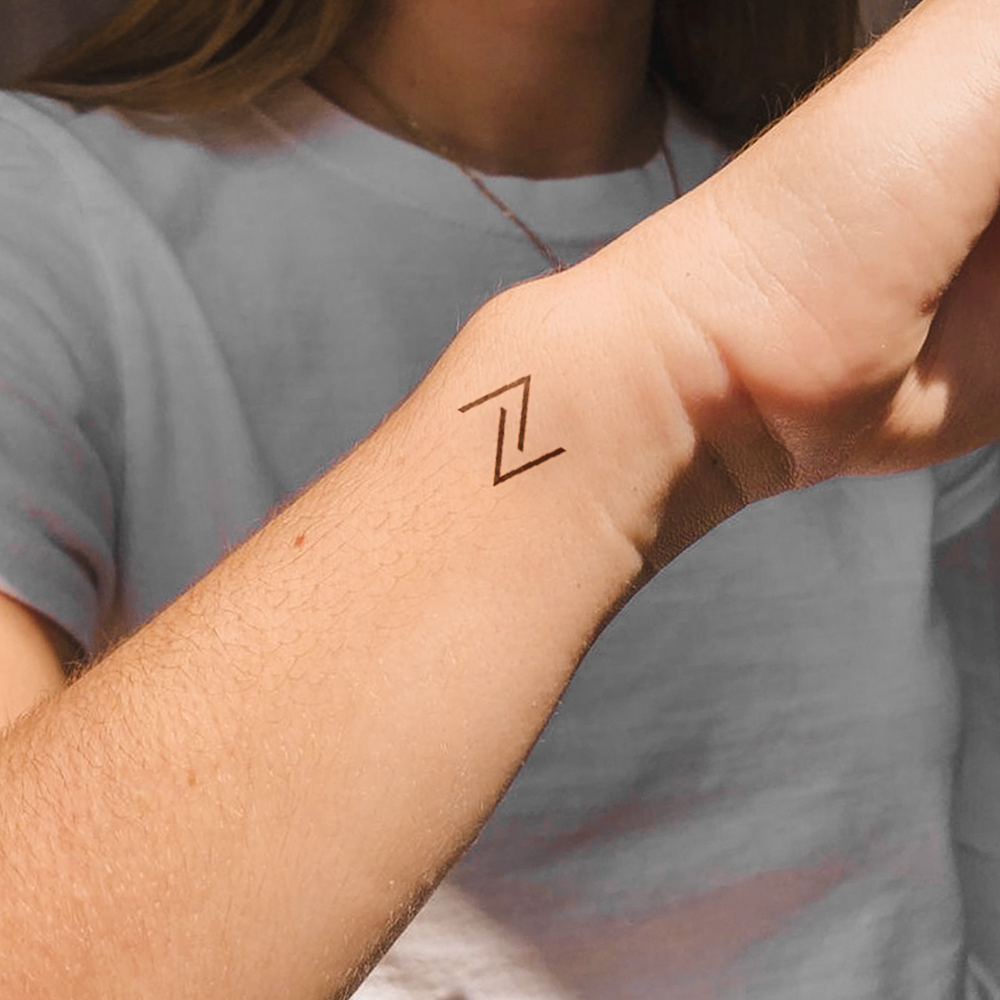 Open triangles tattoo