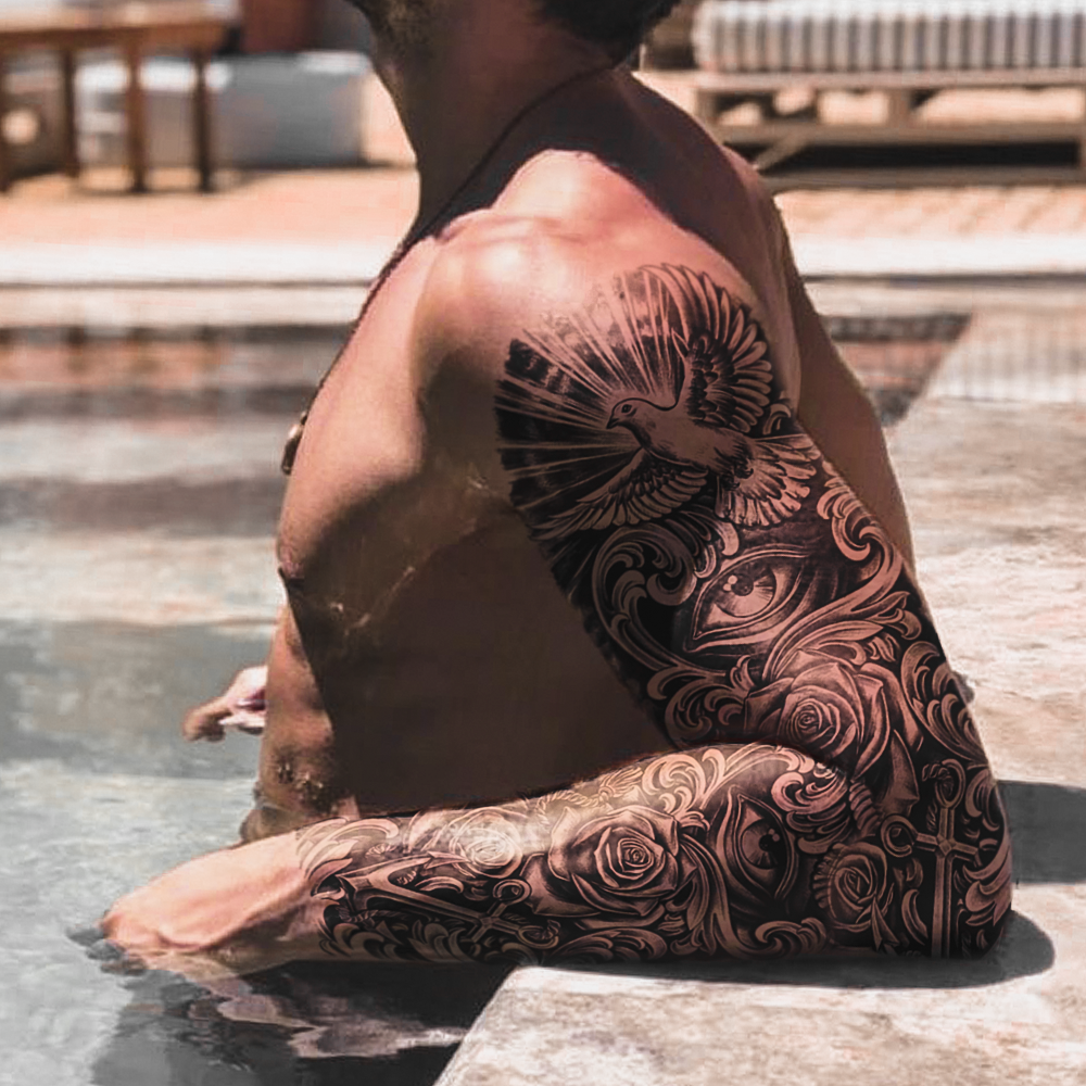 Tatuaje Manga ojo ancla rosa y paloma