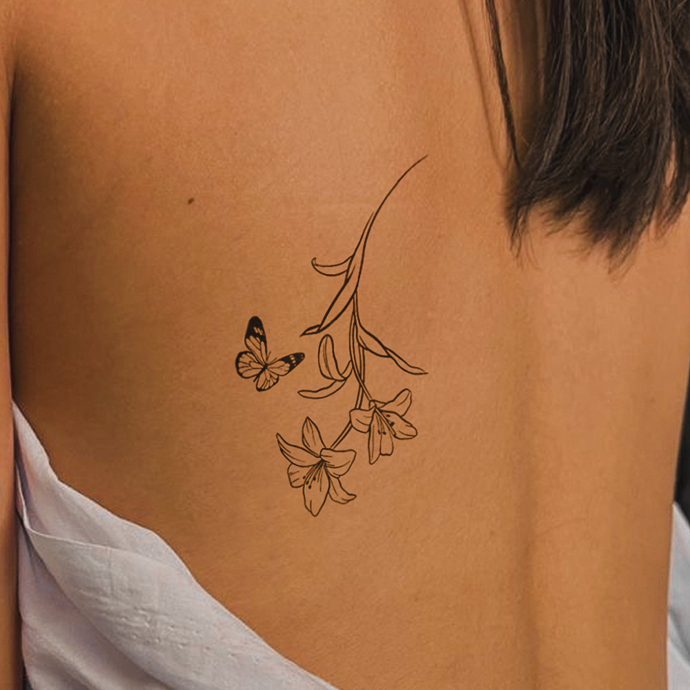 Butterfly and flowers tattoo