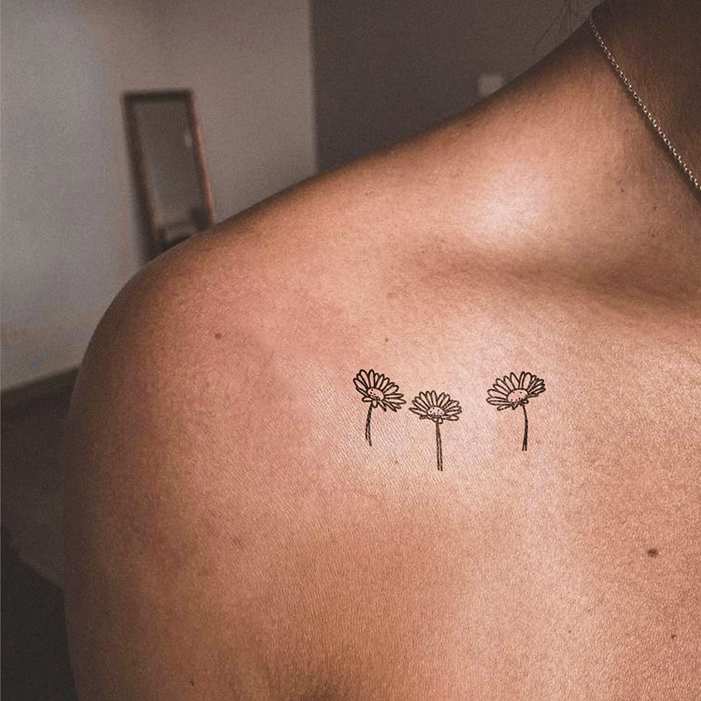 3 daisies tattoo