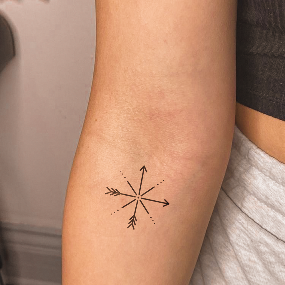 Double arrow star tattoo