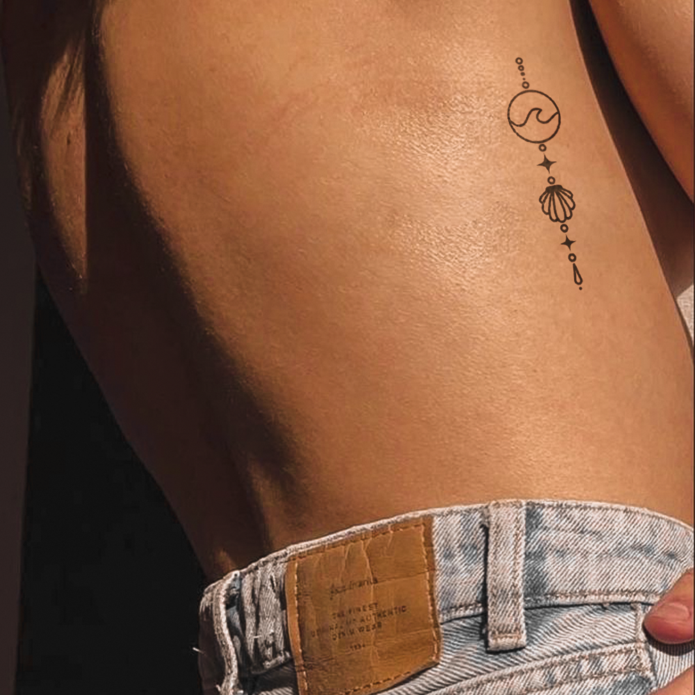 Ornamental Wave Tattoo