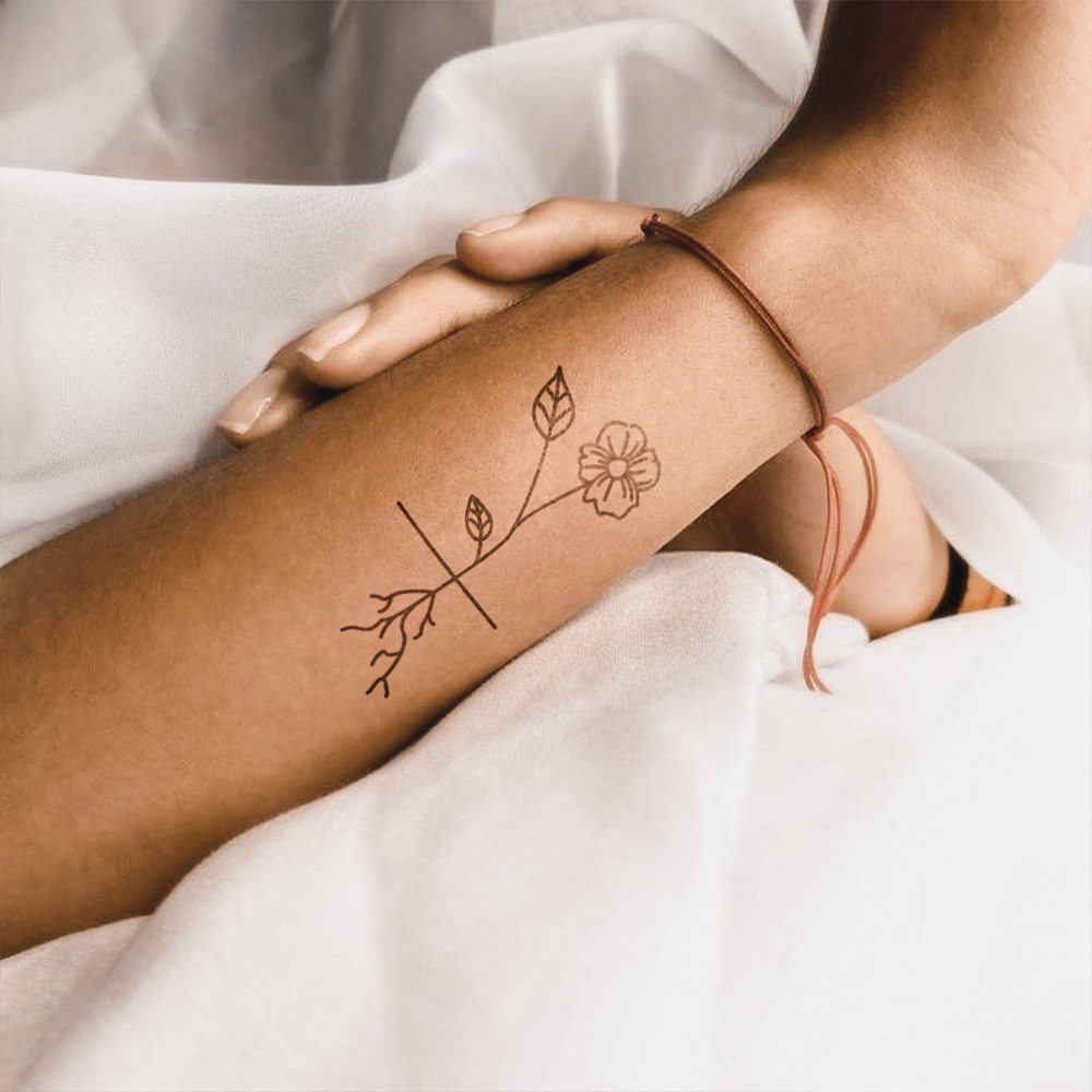 Flower tattoo with root