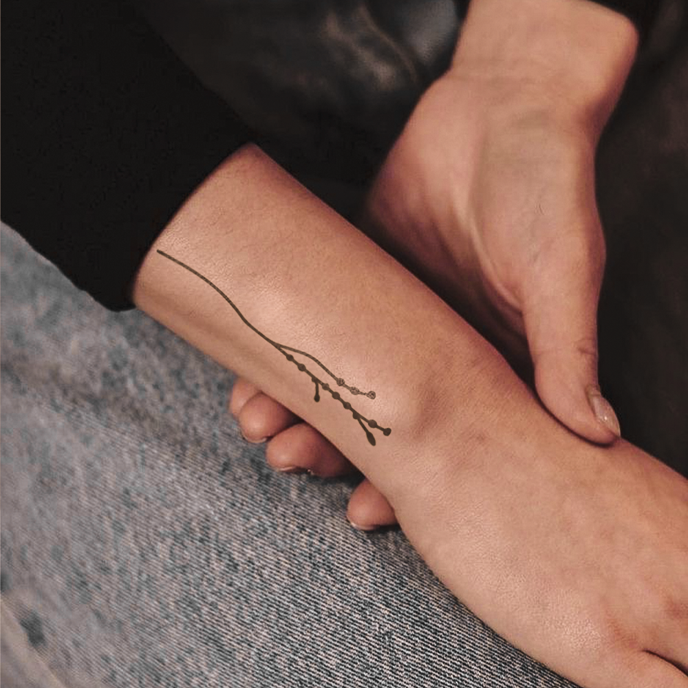 Minimalist Leaf Branch Tattoo