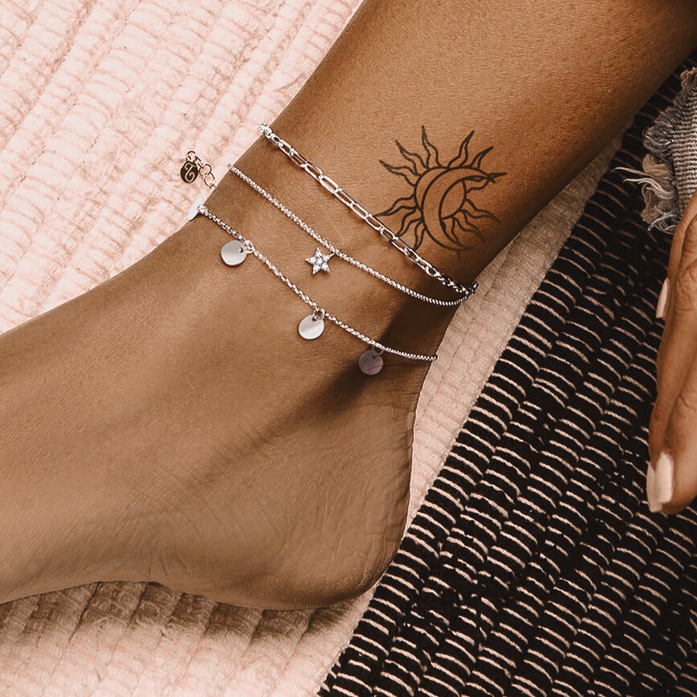 Tatuaje Vieja escuela Sol y Luna