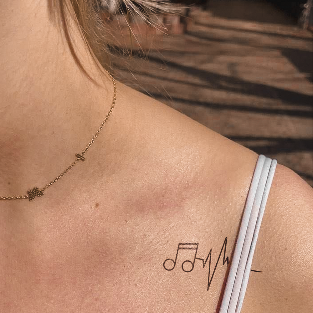 Musical Note and Heartbeat Tattoo